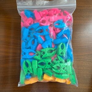 Bundle of colourful bobbin holders